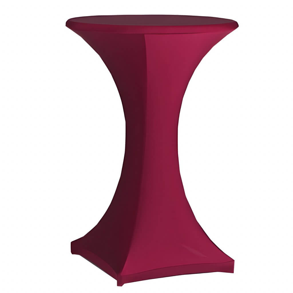 Ein hoher, runder Stehtisch ist mit einer eng anliegenden, tiefgezogenen Stehtischhussen Deluxe Tischhusse bezogen